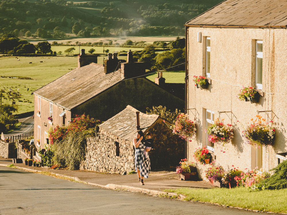 Walking by quaint houses in a small Lake District town during our stay in Cumbria.