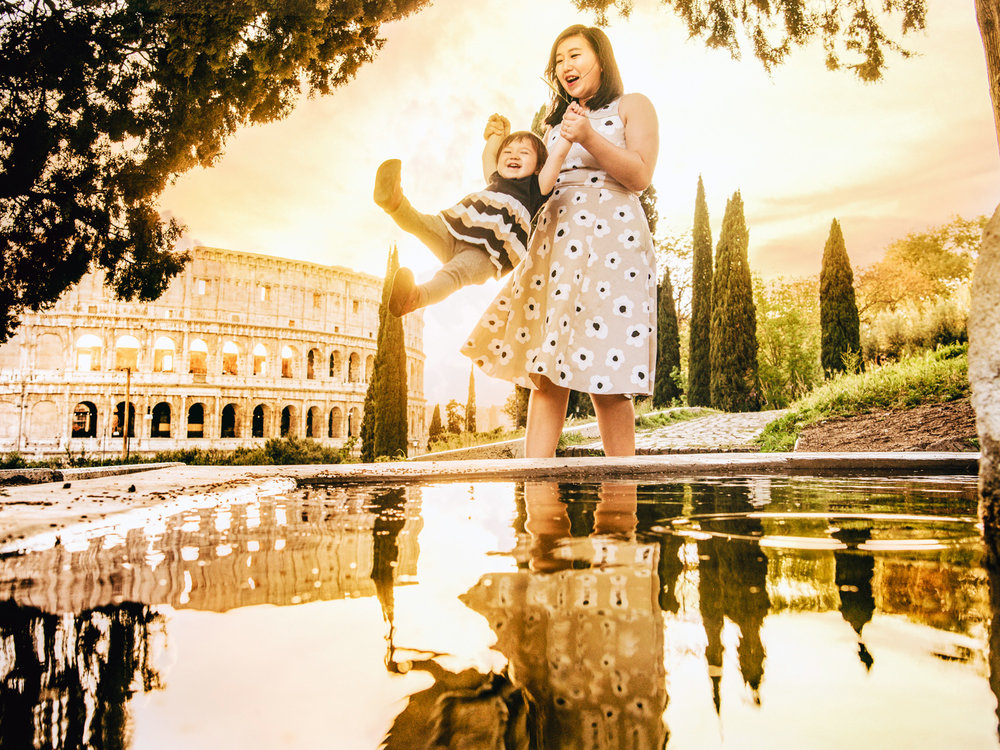 Lisa enjoys being swung over a park near the colosseum in Rome.