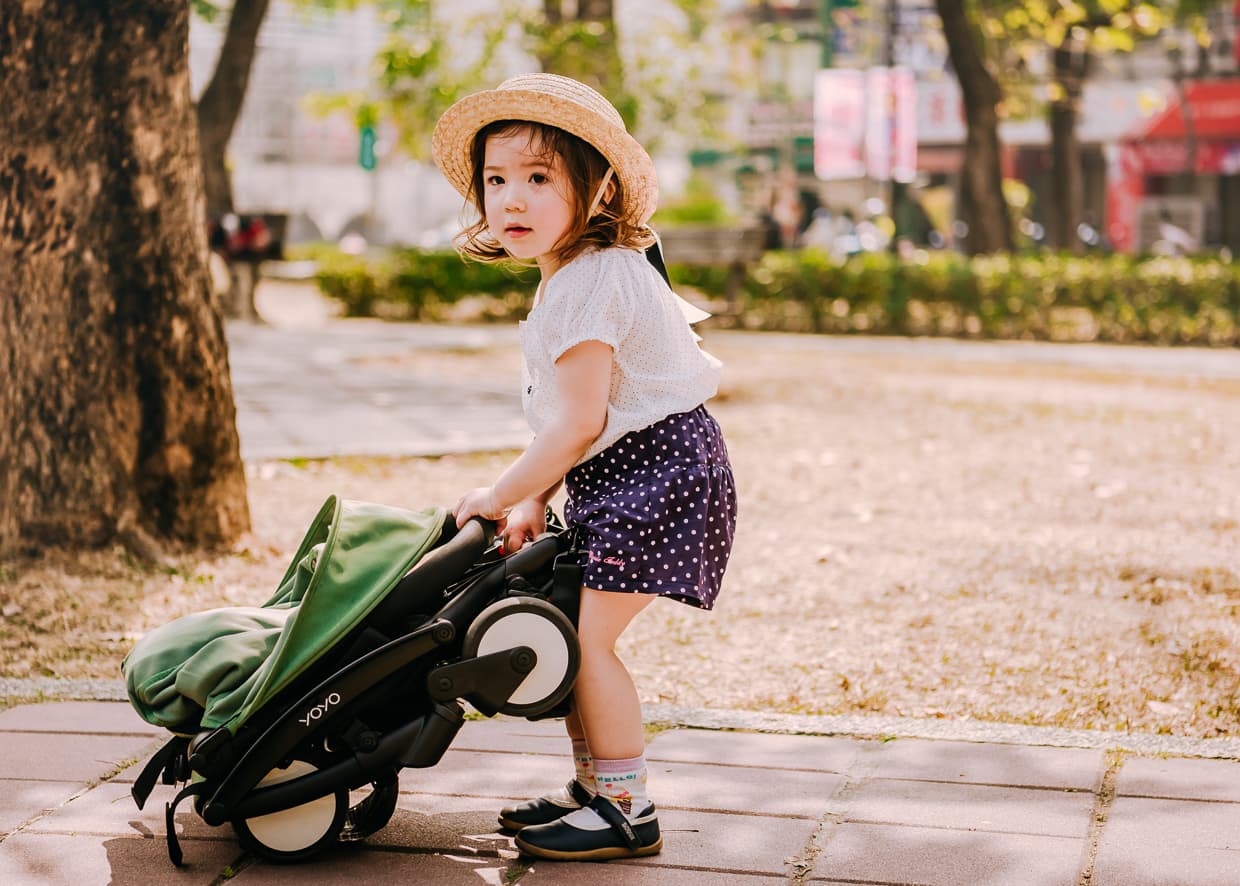 Lisa playing with our travel stroller