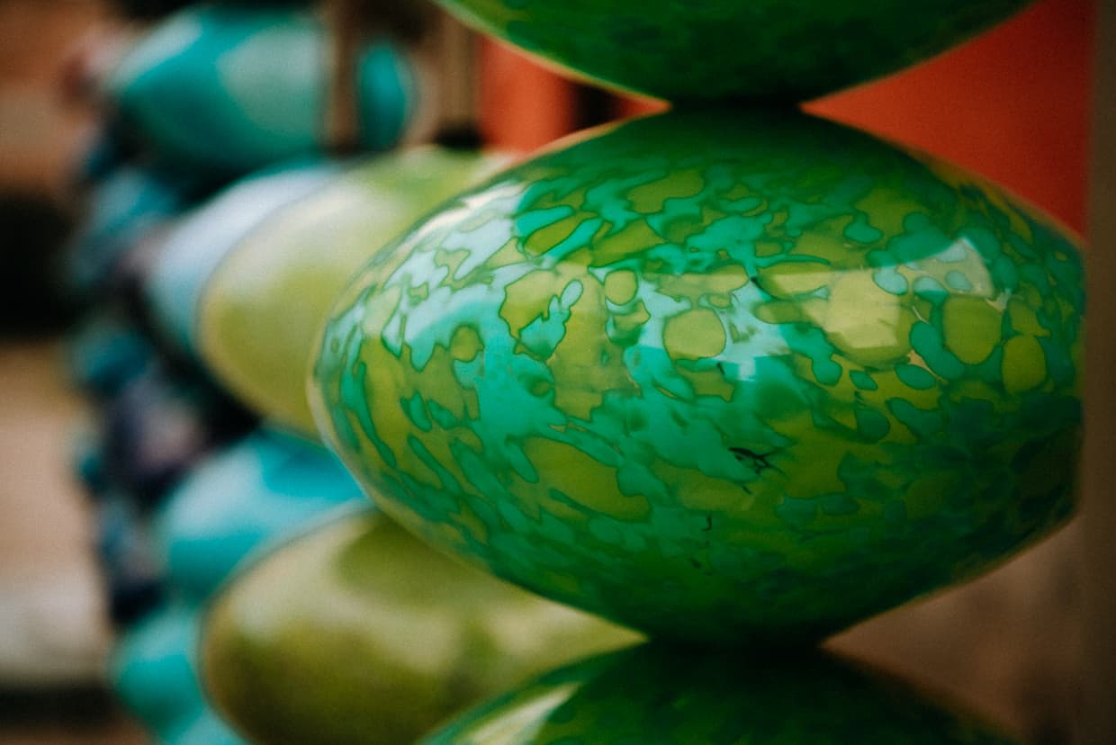 Giant glass abacus beads on a Murano art installation.