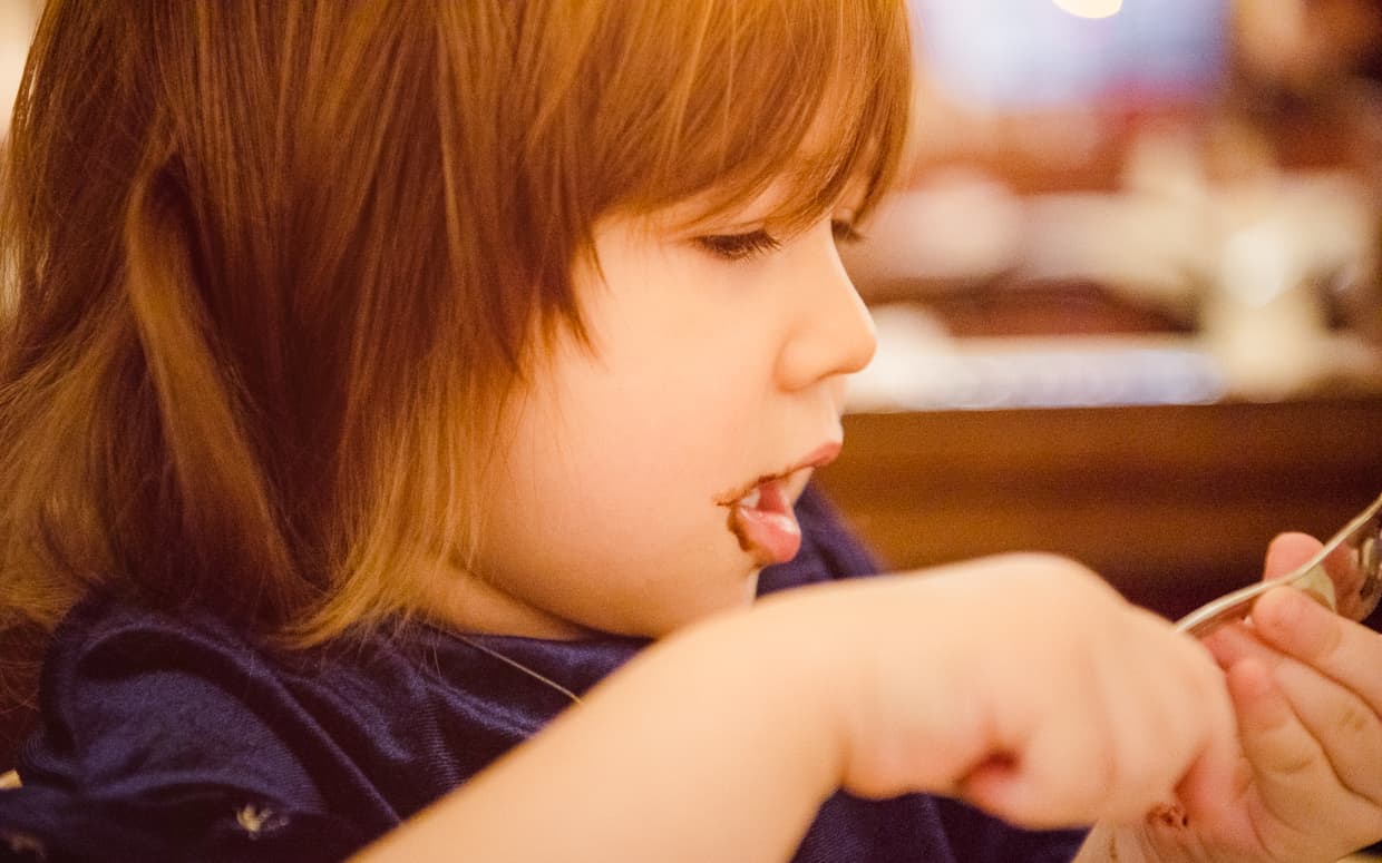 Eating cake at cafe Central in Vienna, Austria.