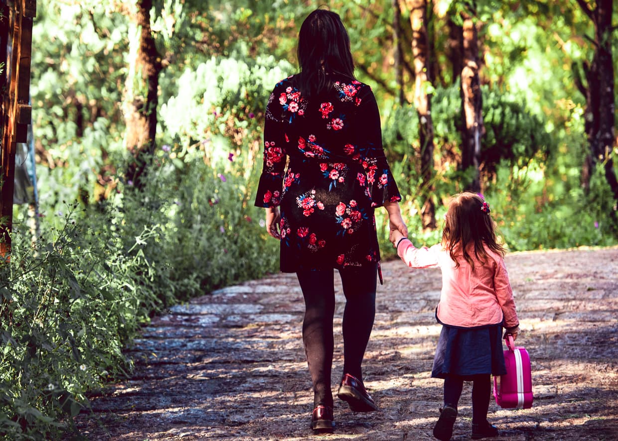 Lisa walking with her travel potty.