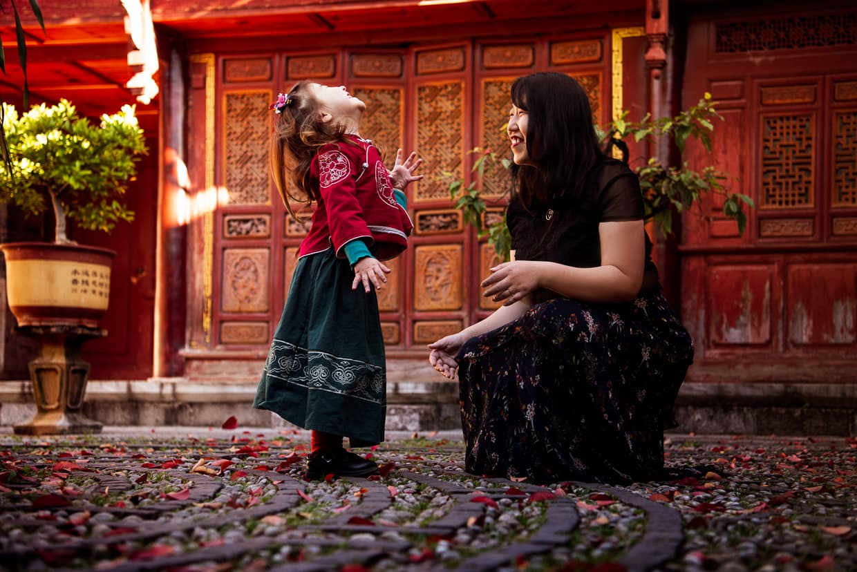 Playing with leaves in Mufu Palace.