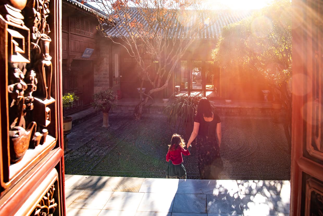 A palace courtyard with a tree in Lijiang, China.