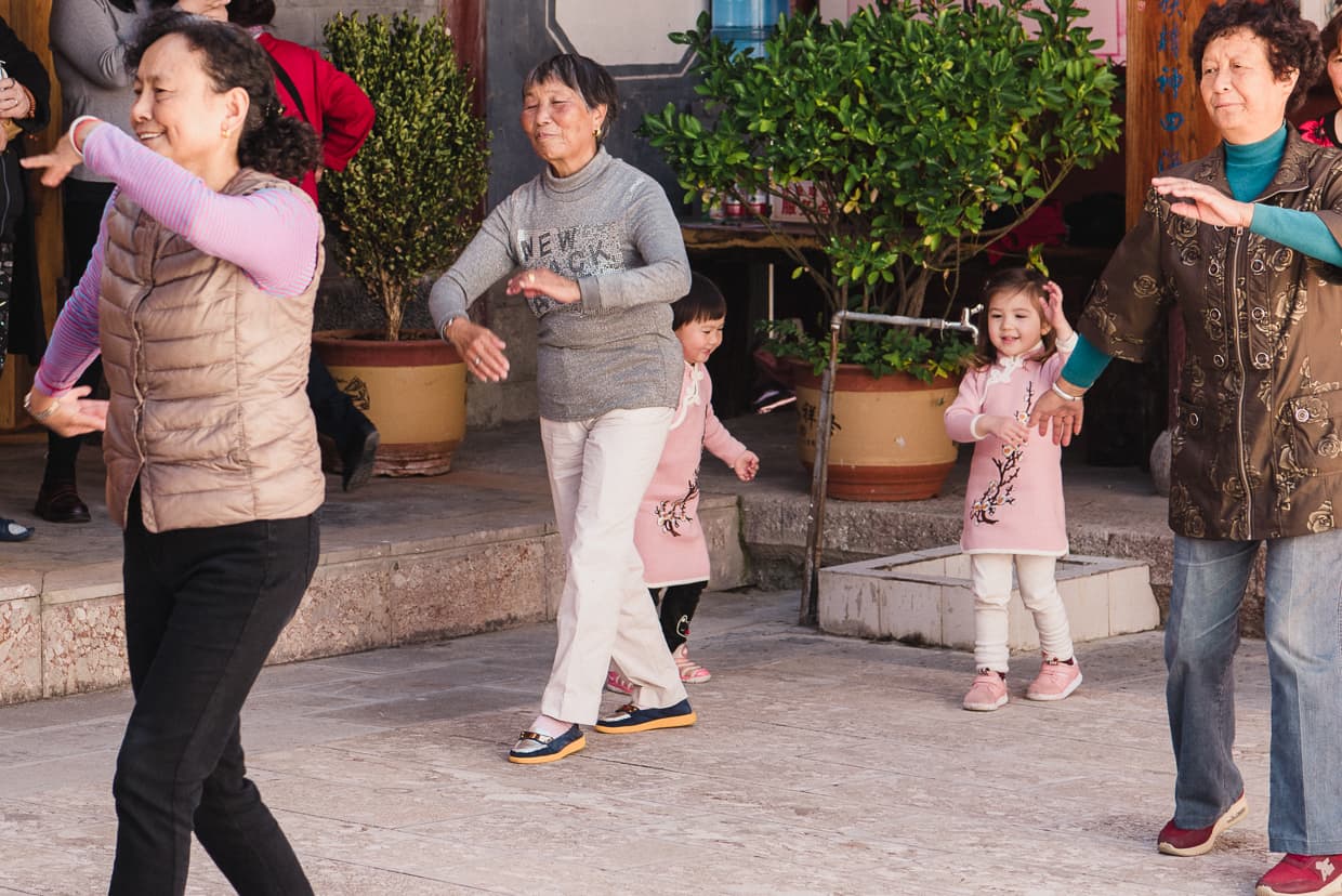 Women practicing traditional dance in Lijiang, China