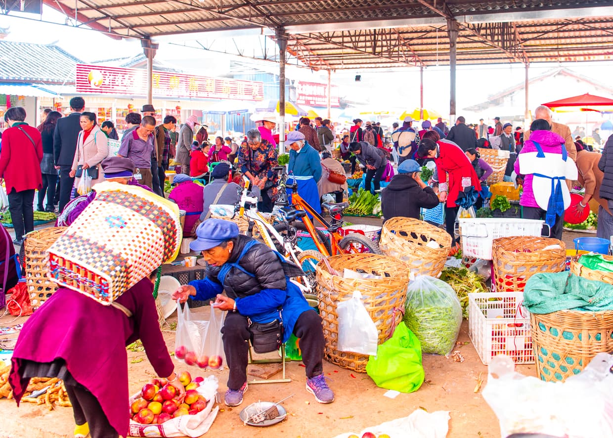 A busy produce market in the Lijiang Old Town.