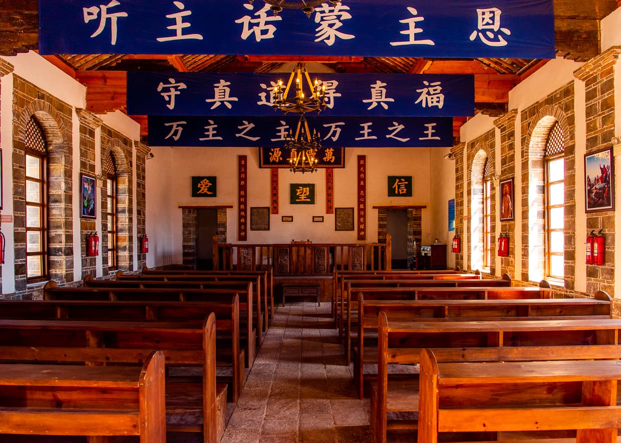 Pews of a church in the Lijiang, Old Town.