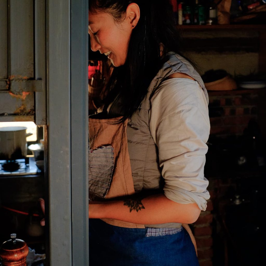 Li Li in the kitchen of her farmhouse.