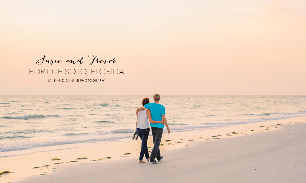 Couple walking along the beach at sunset in Florida