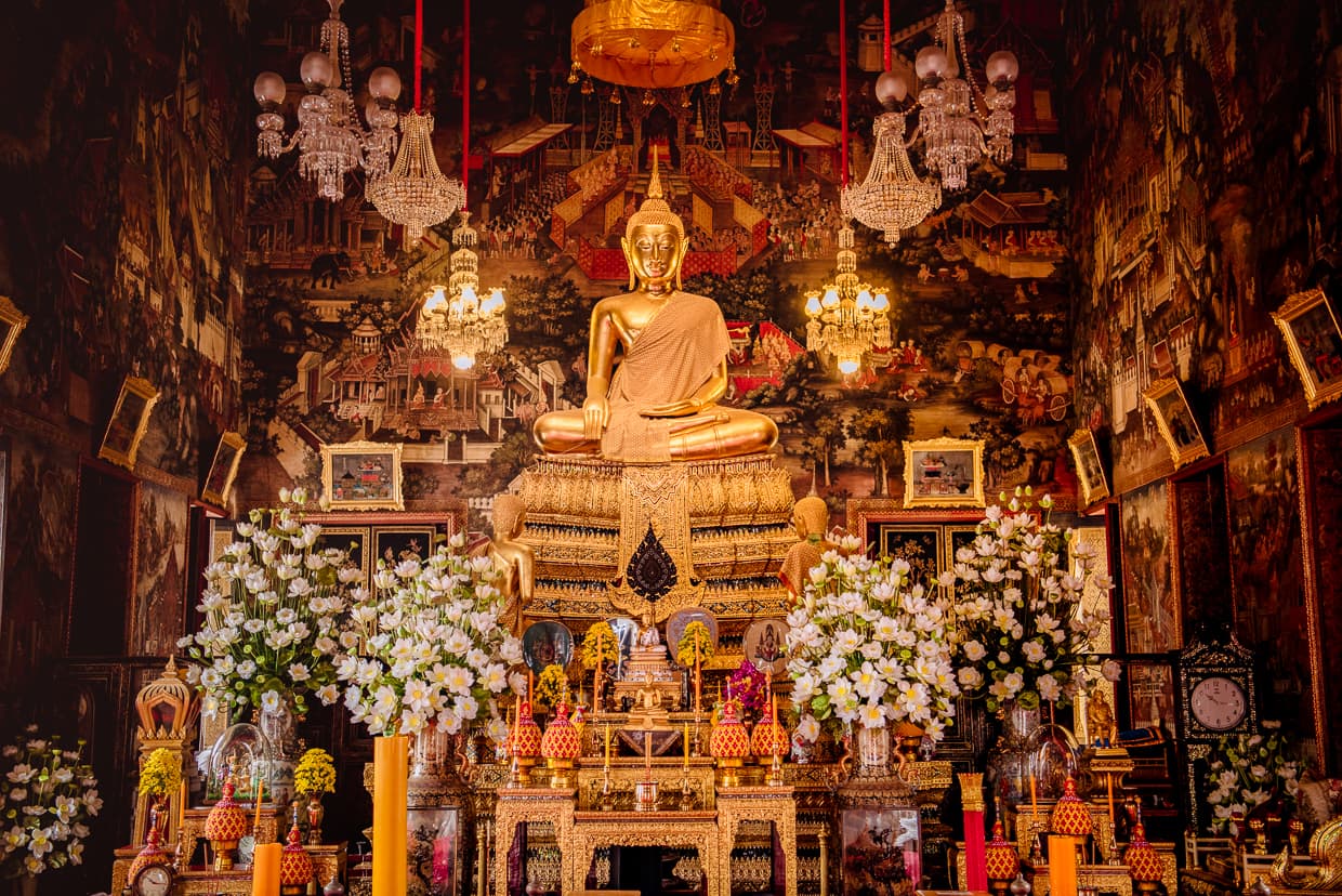 The Golden Buddha statue inside Wat Arun's Ordination Hall.