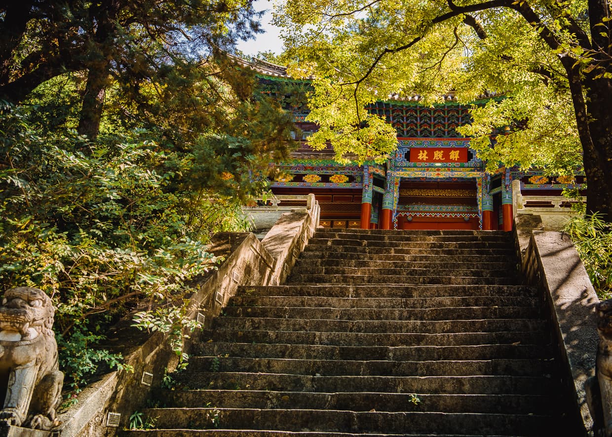 A temple in the woods near black dragon pool in Lijiang, China.