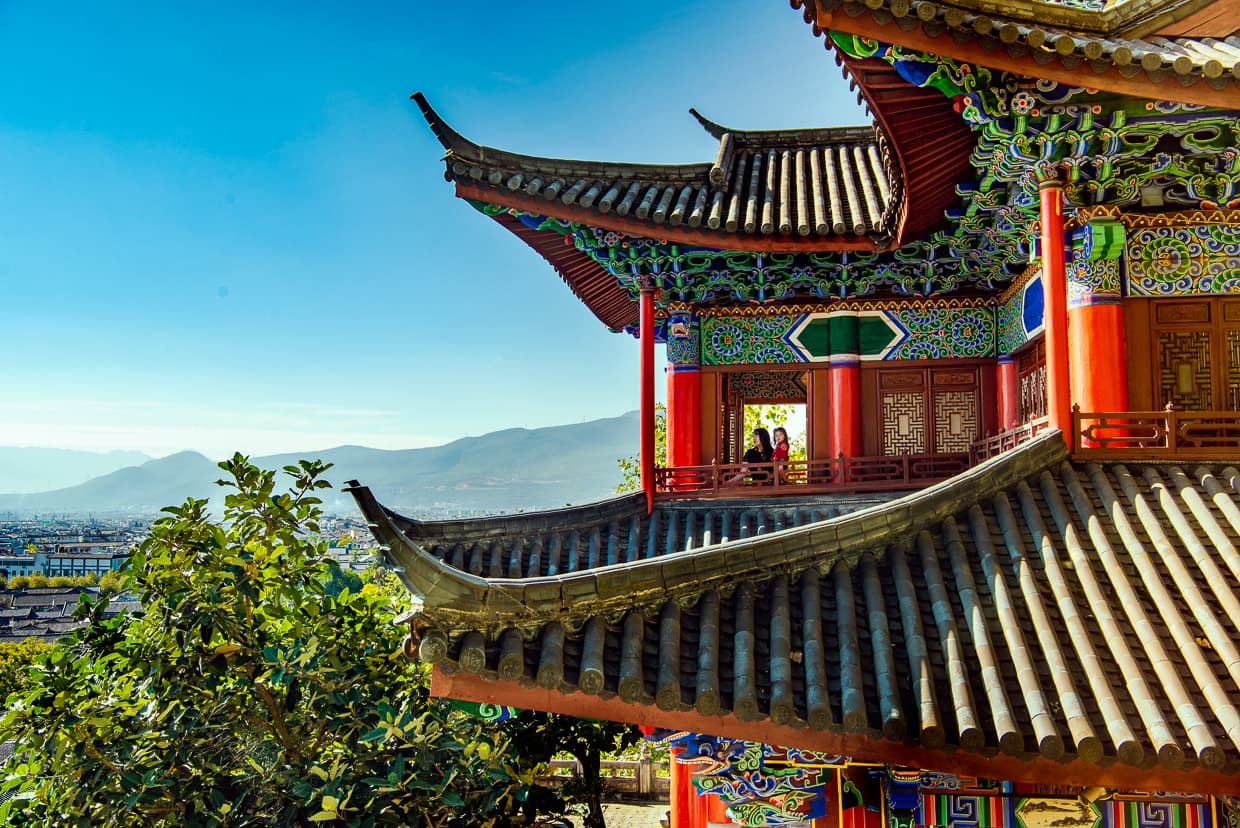 Family enjoying the view from a temple in Lijiang, China.