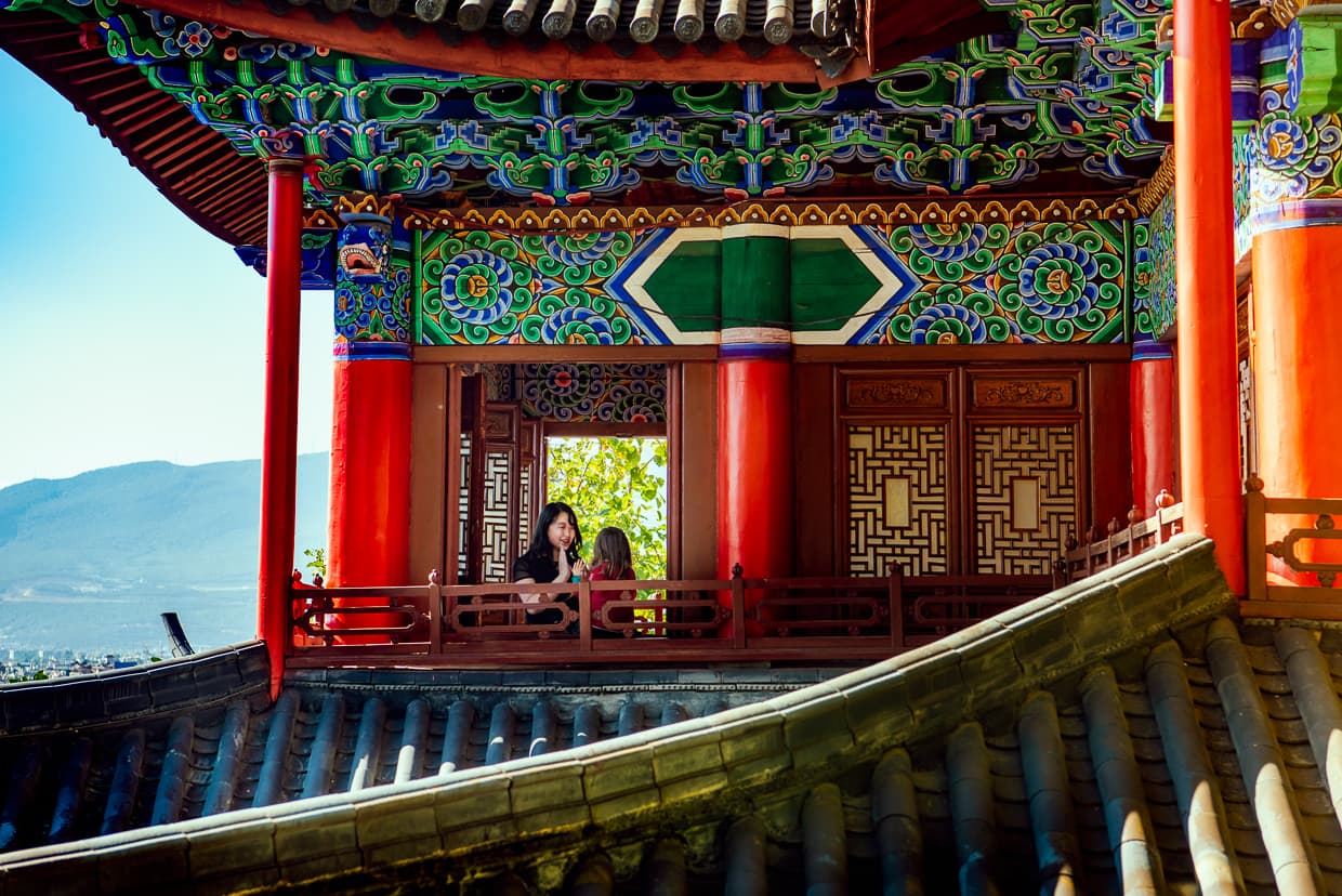 Dannie and Lisa on the second floor of a Buddhist Temple.