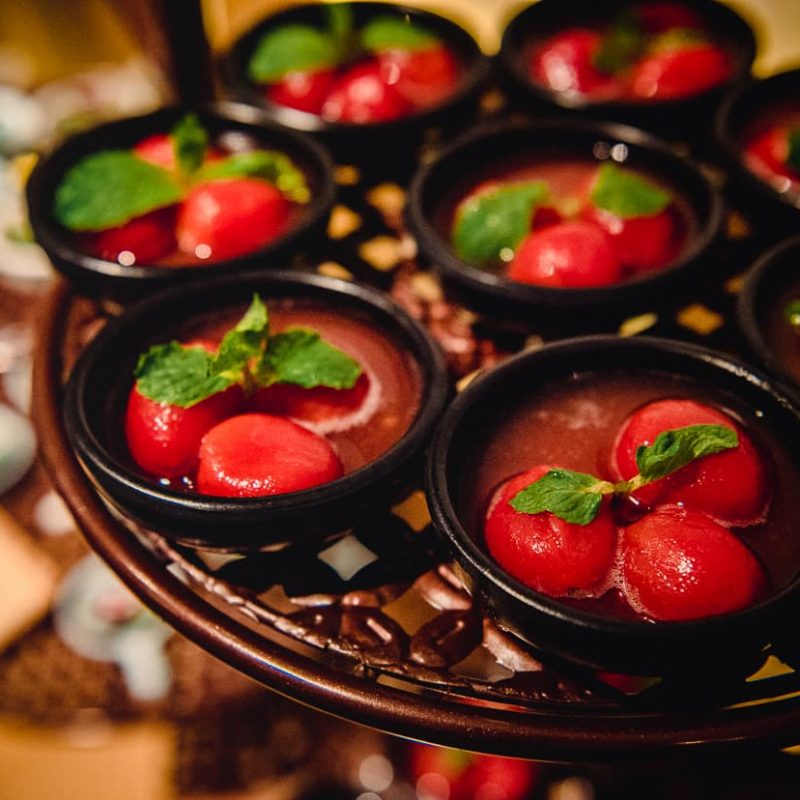 Cherry tomatoes in cherry sauce at a Dali, China vegetarian restaurant.