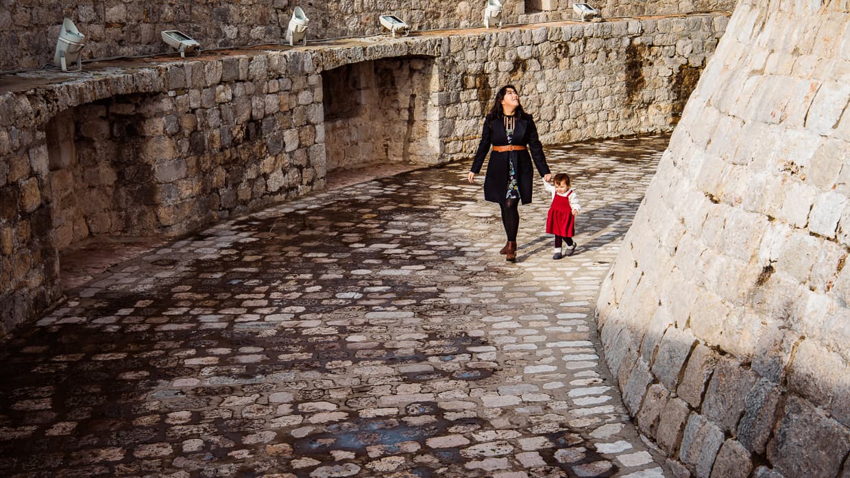 Walking around a tower on the highest point of the city walls of Dubrovnik, Croatia.