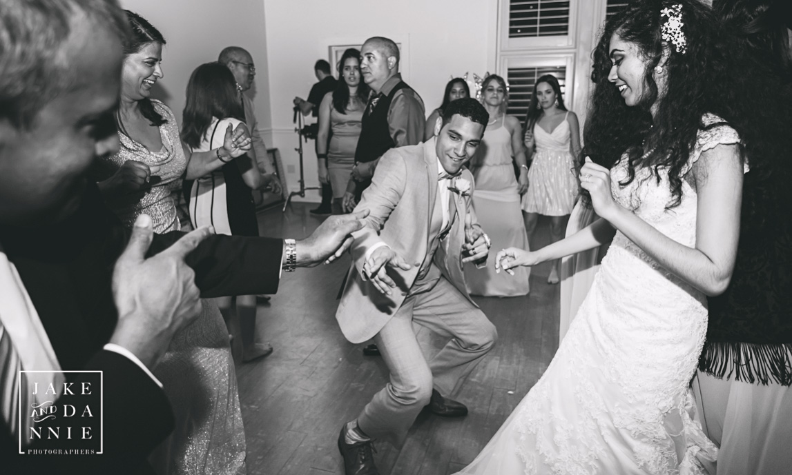 Newlyweds getting down at their reception.