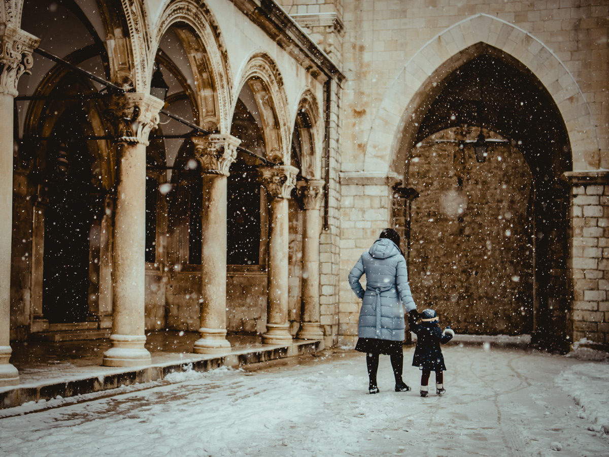 Snow falling in the streets of Dubrovnik Croatia on a winter day