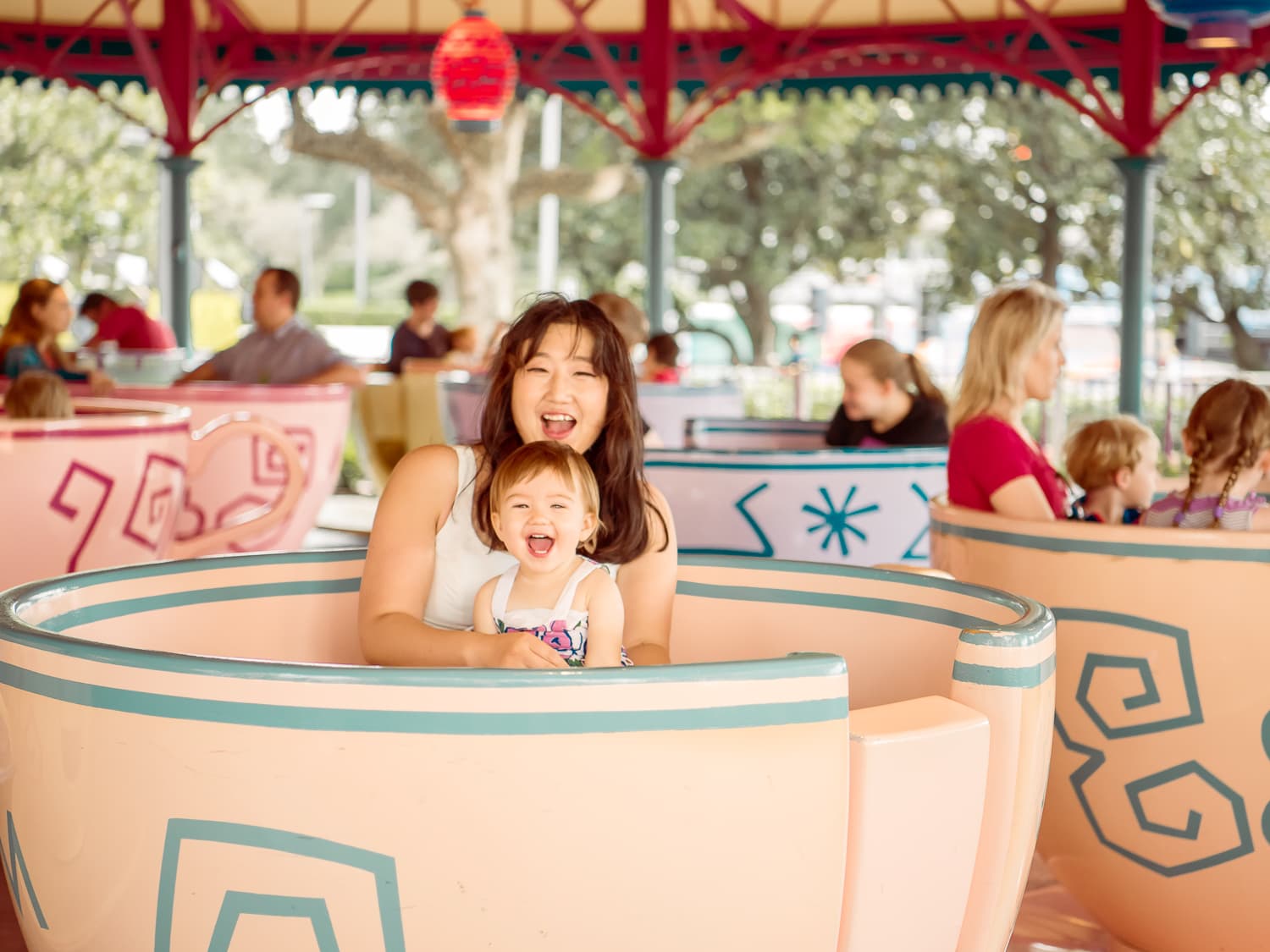 Lisa enjoying the Disney teacups a week before Christmas.