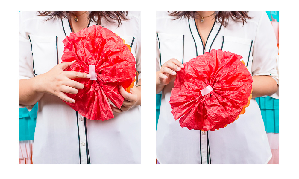 Dannie gets ready to tape up the tissue paper flowers before the photo shoot