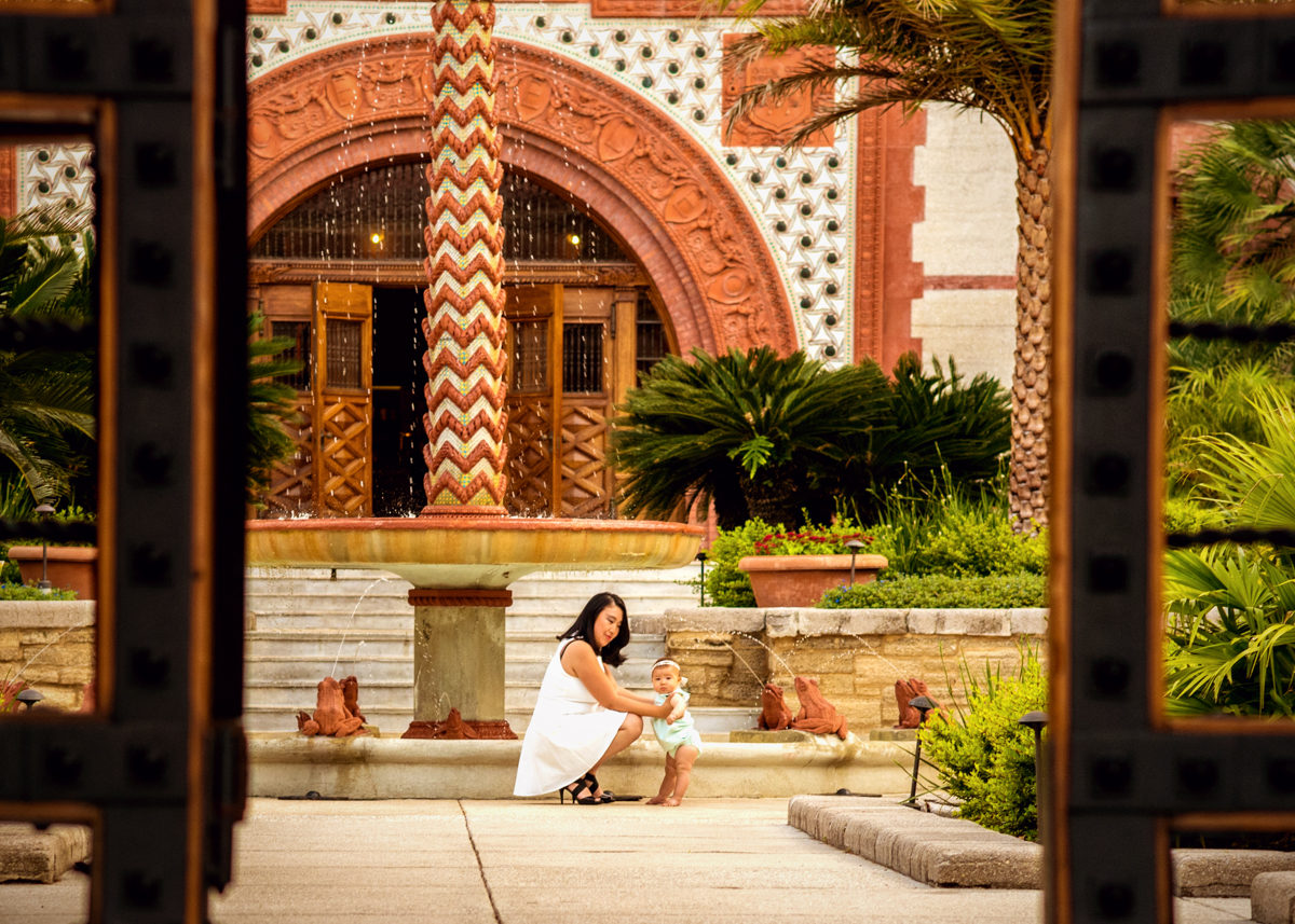 Mom and daughter standing at the entrance of flagler college