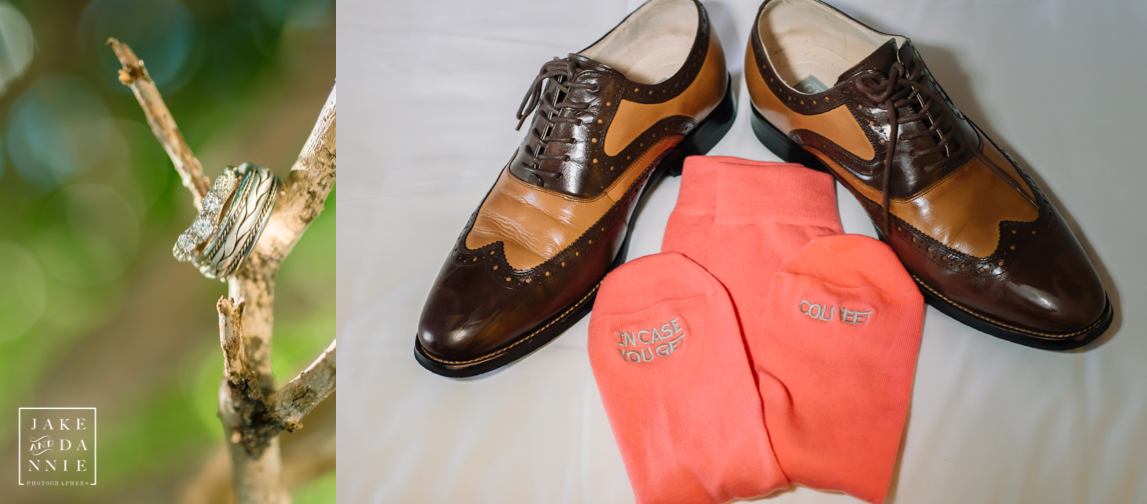The groom's shoes and novelty groom socks on the bed.  And the wedding bands hang on a branch.