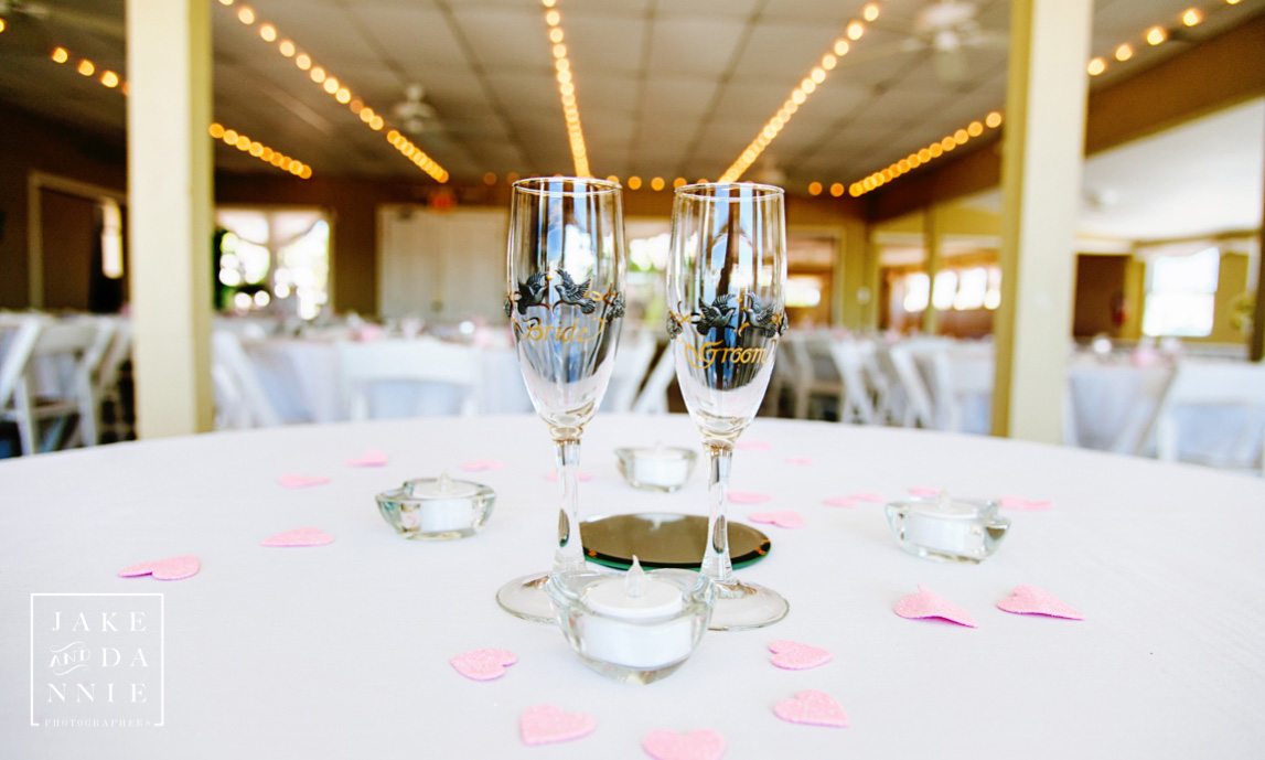 His and hers chamagne glasses in the reception hall, decorated long before the wedding.