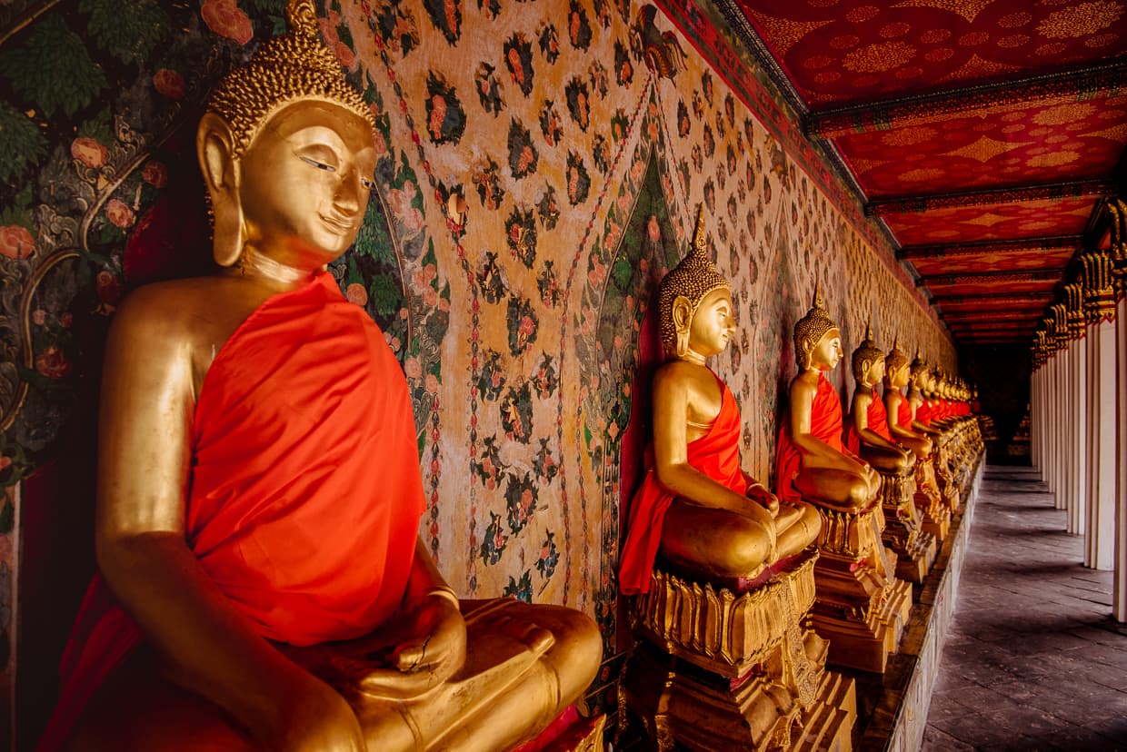 A row of Buddha Statues at Wat Arun in Bangkok, Thailand.