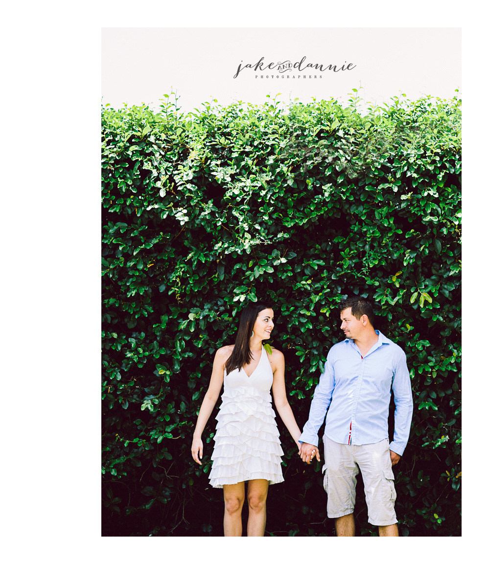 Our couple poses for a photograph looking into each other's eyes.