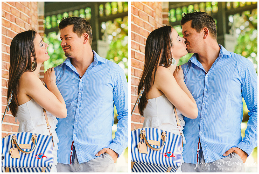 Our couple kisses on the university of tampa campus