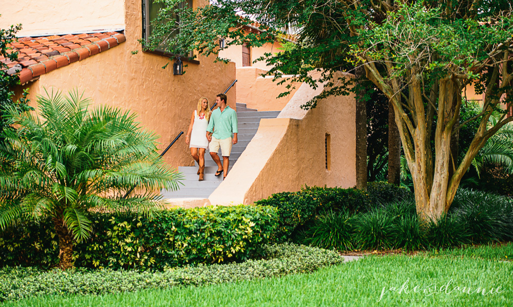 Couple walks down the stairs at stetson law in Gulfport, Florida