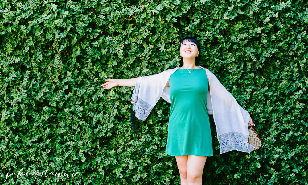 Dannie strikes a pose in front of some foliage as we walk through the streets of savannah