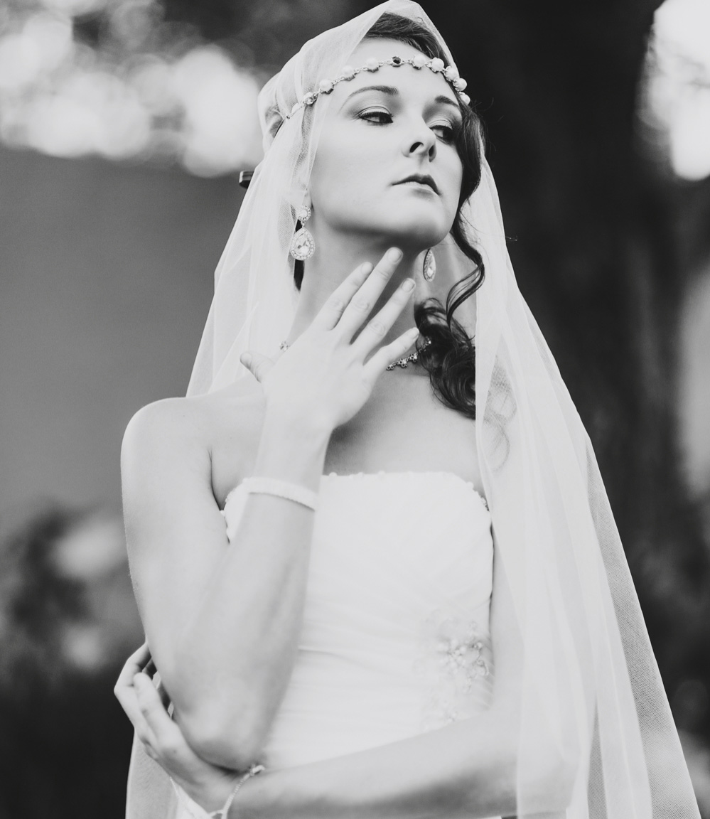 A bride contemplates her wedding while waiting in the garden