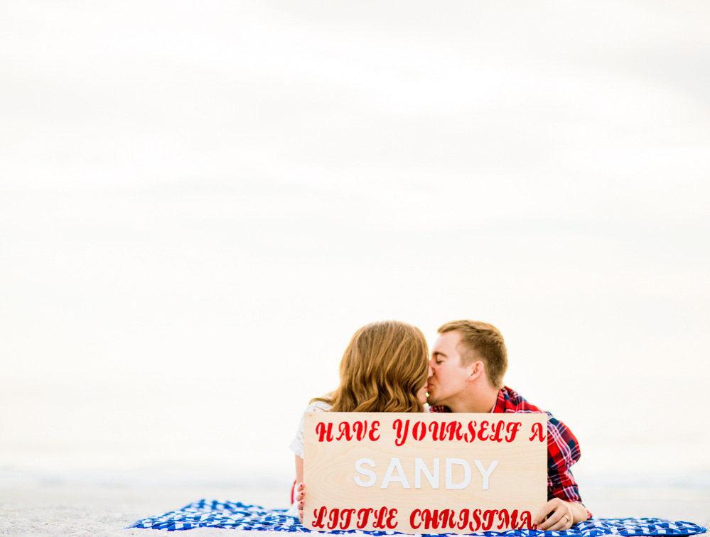 Florida sunshine, the beach, a blanket, and a kiss. Who could ask for more.