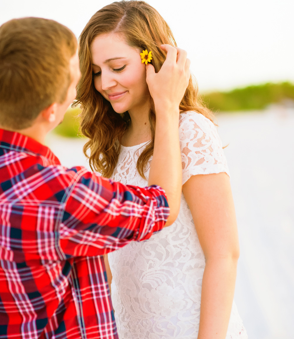 Nothing says I love you like putting a flower in her hair.