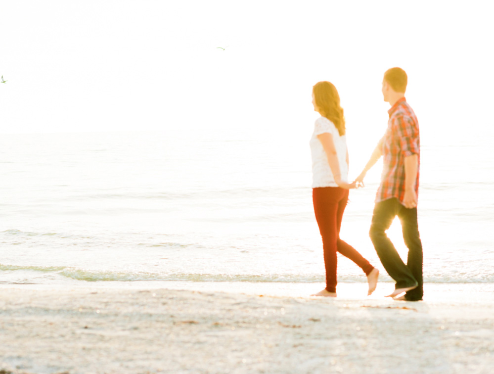 Sunset on the beach is a great time for photography, especially for couples.