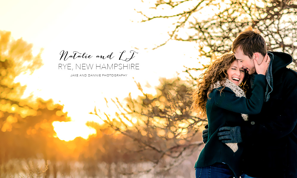 Couple hold each other in front of winter sunset during engagement session