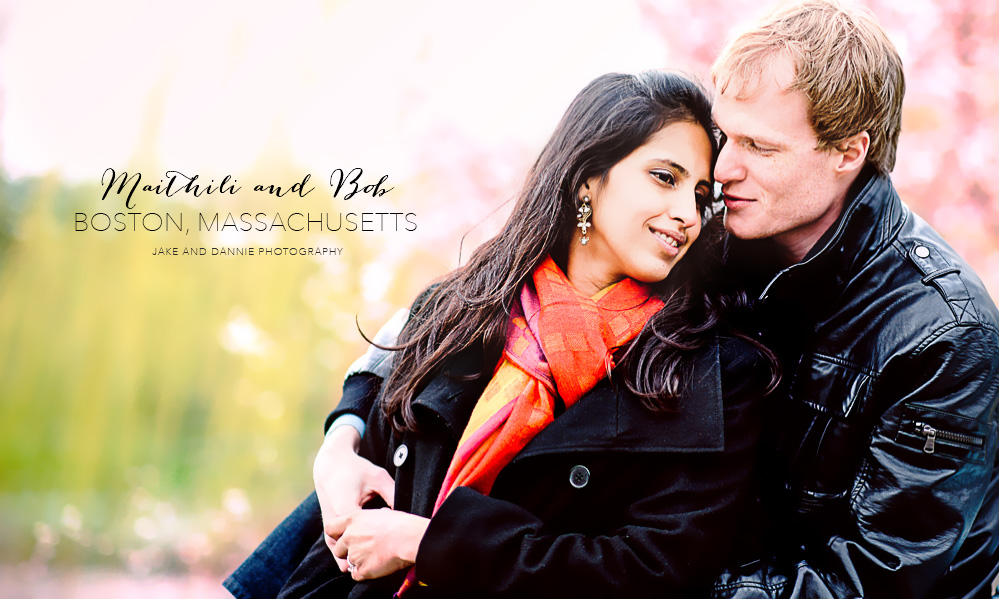 Couple in front of flowering tree during engagement shoot in Boston