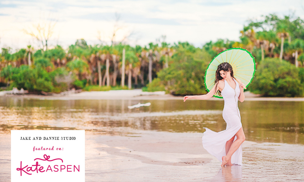 Our beach bridal photo with an umbrella featured on Kate Aspen