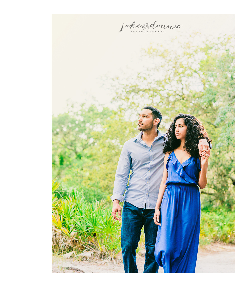 couple takes a sunny walk with photographer