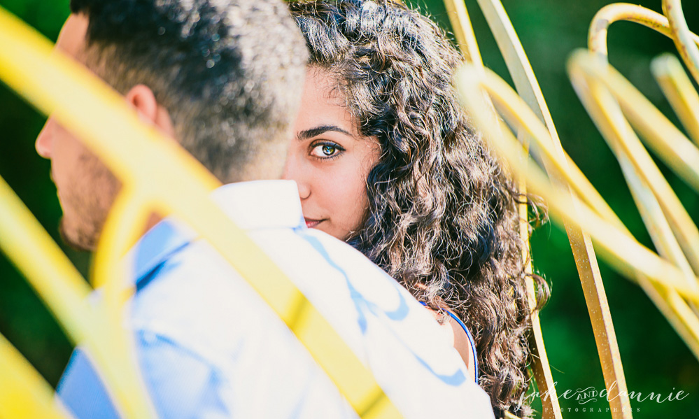 Future bride looks over future grooms shoulder in tarpon springs florida