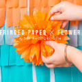 Fringed paper photo booth backdrop diy