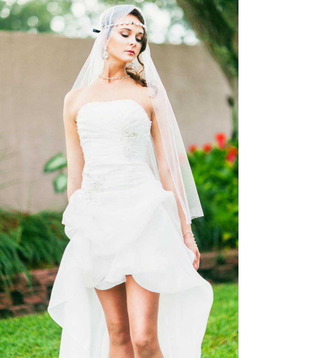 A bride in the garden waits for her wedding