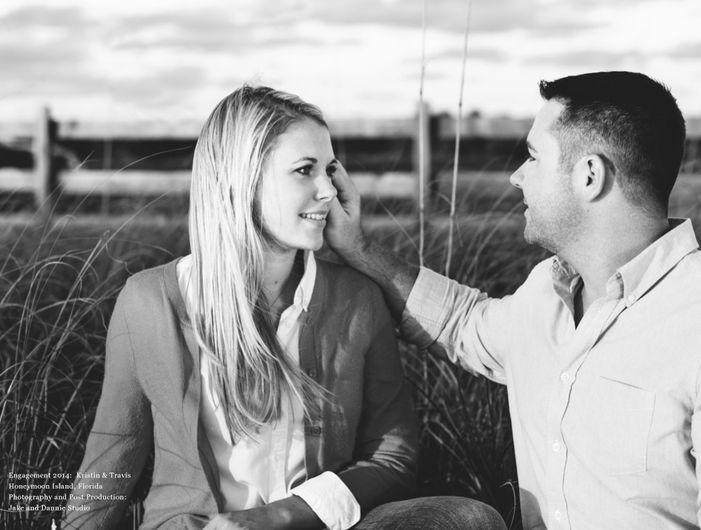 Future bride and groom share a tender moment near the beach