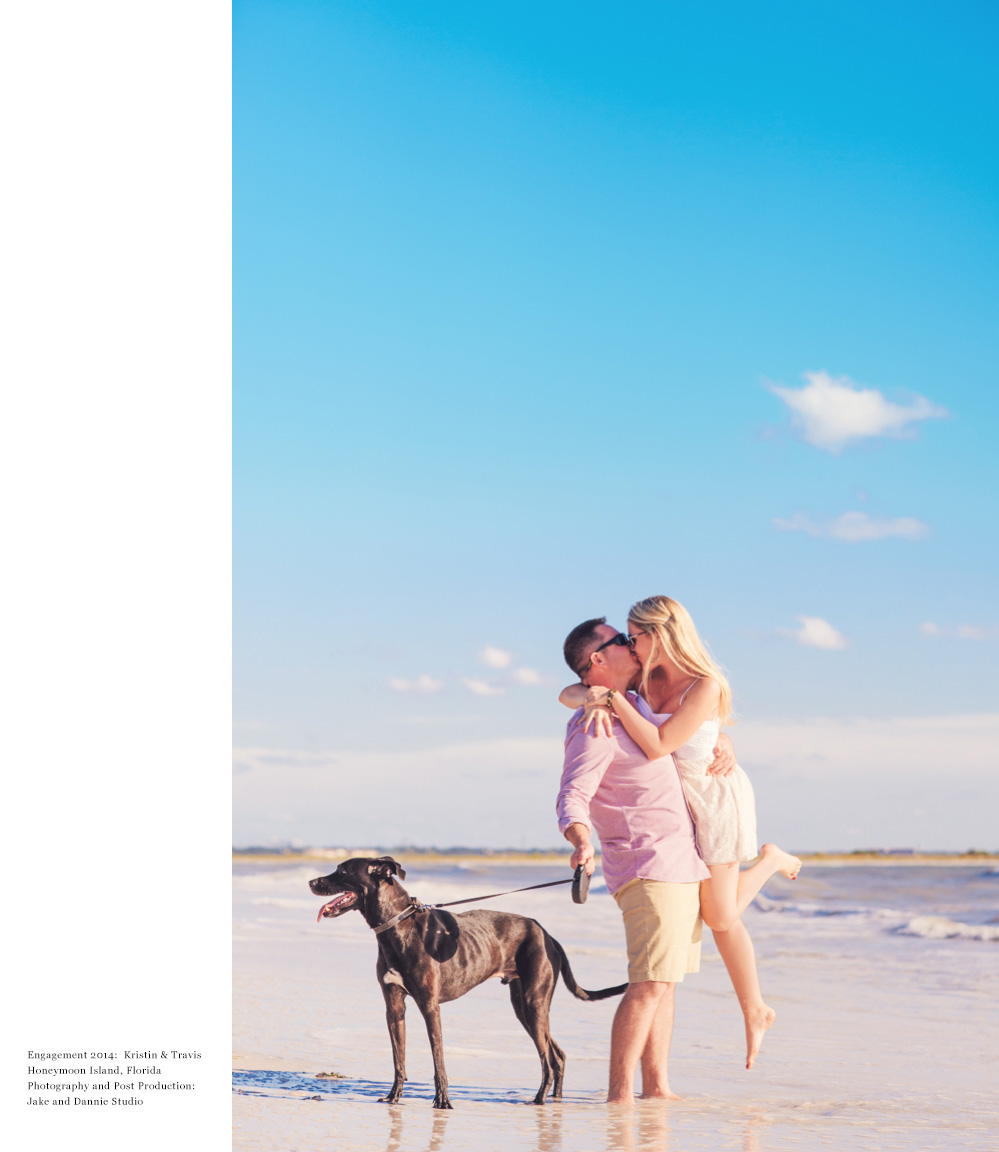 Dog isn't interested in romantic lift and kiss on the beach